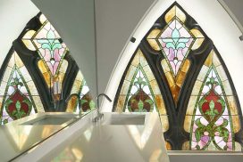 Master bathroom with stained glass window in a converted church condo building Chicago | Solstice Stained Glass